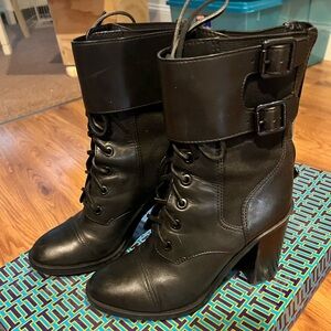 Black Tory Burch tie up heeled boots, worn one time size 9.